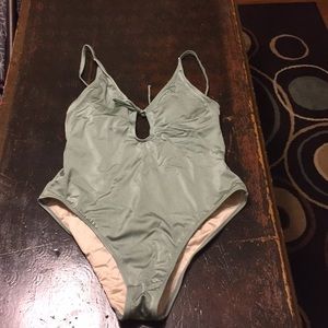 PAC sun One piece mint green bathing suit.
